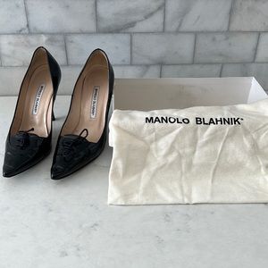 *MANOLO BLAHNIK* Black patent leather heels.
